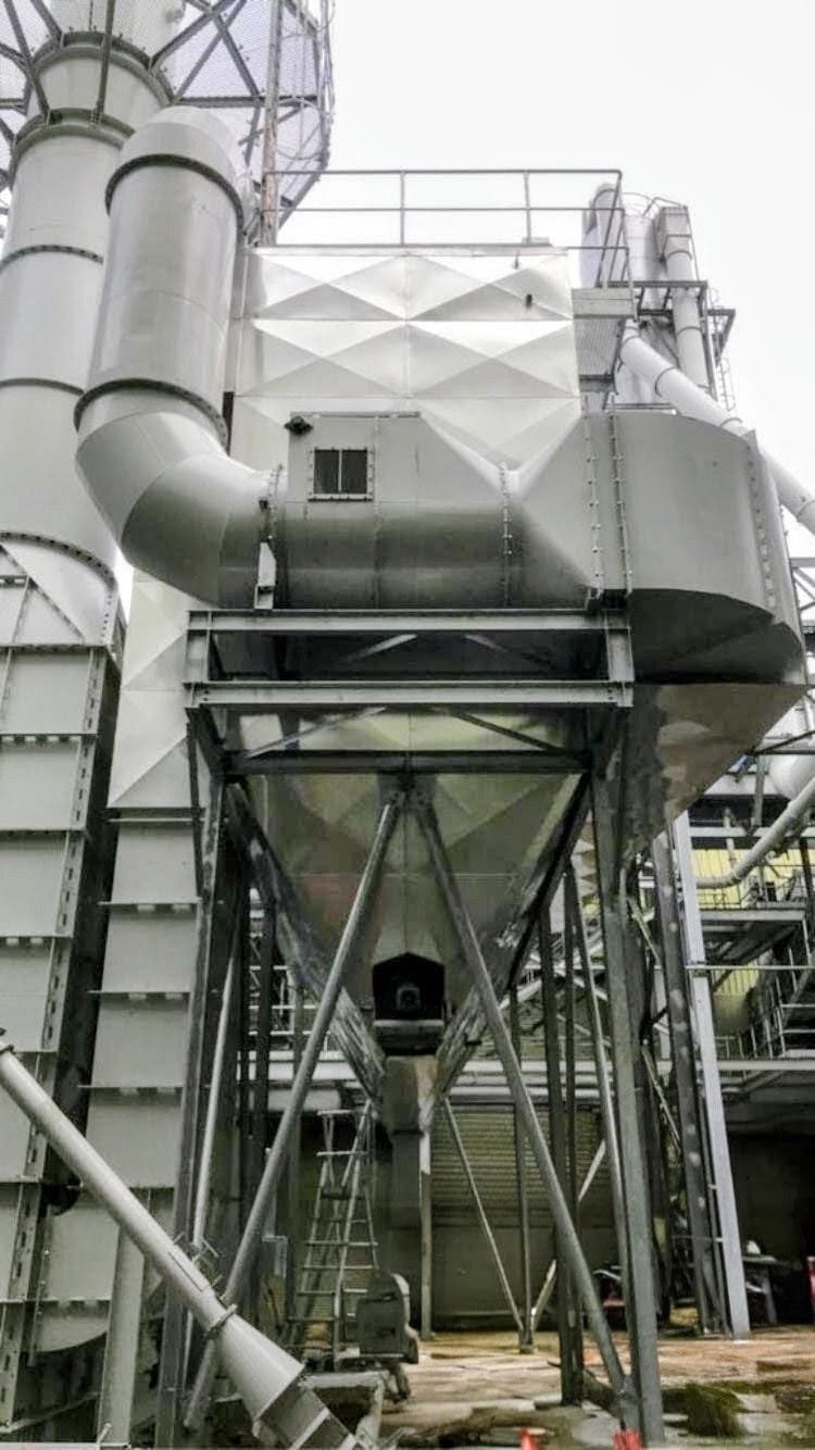 Stainless steel diamond panel cladding on industrial plant — specialist work by Alumitherm Assist